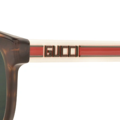 Shop Gucci Gg0462s Sunglasses Brown