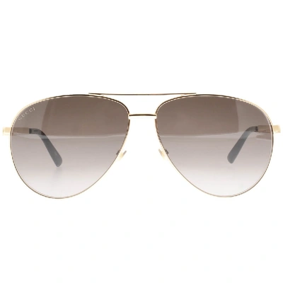 Shop Gucci Gg0137s Aviator Sunglasses Gold