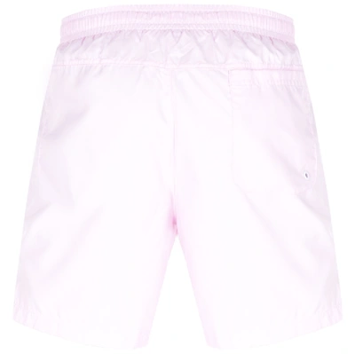 Shop Nike Flow Logo Swim Shorts Pink