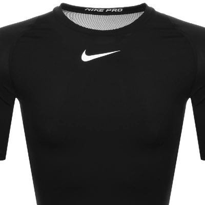 Shop Nike Training Compression Logo T Shirt Black