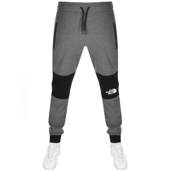 black and grey north face tracksuit