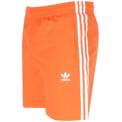 Shop Adidas Originals 3 Stripes Swim Shorts Orange