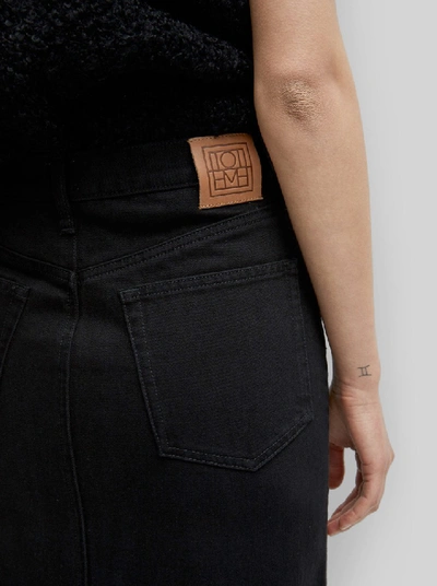 Shop Totême Bitti Denim Skirt In Black