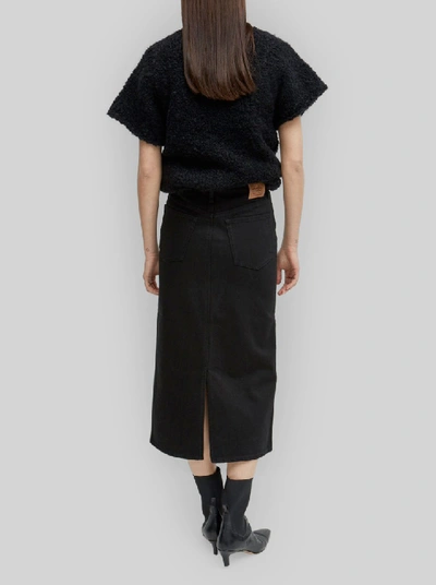 Shop Totême Bitti Denim Skirt In Black