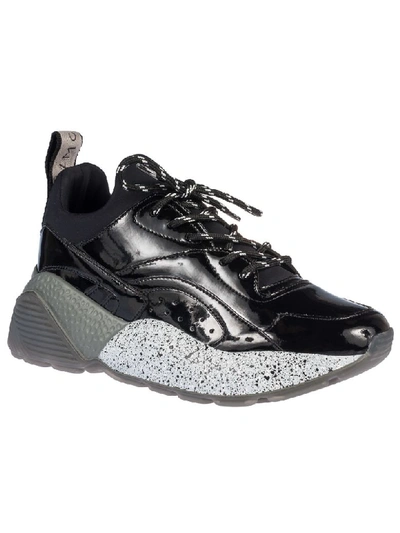 Shop Stella Mccartney Perforated Sneakers In Black