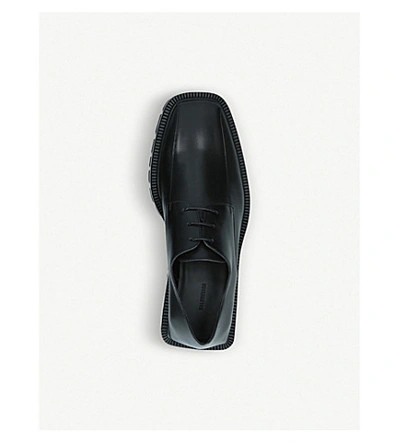 Shop Balenciaga Outdoor Rim Leather Derby Boots In Black