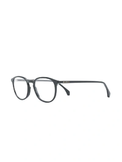 Shop Gucci Round Frame Glasses In Black