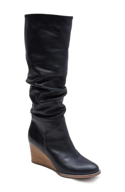 Shop Andre Assous Saffi Slouch Wedge Boot In Black Leather