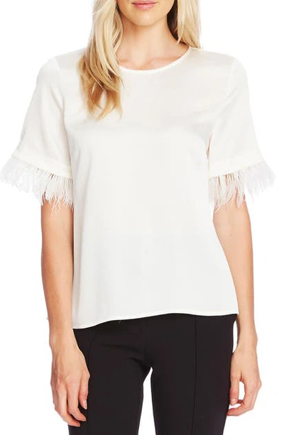 Shop Vince Camuto Hammered Satin Feather Cuff Top In Pearl Ivory