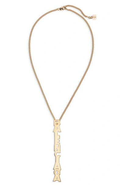 Shop Balenciaga Typo Pendant Necklace In Vibrated Gold