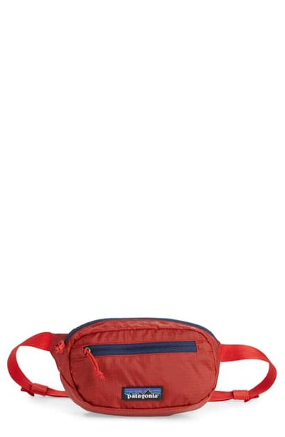 Shop Patagonia Black Hole(tm) Ultralight Mini Belt Bag In Rire Rincon Red