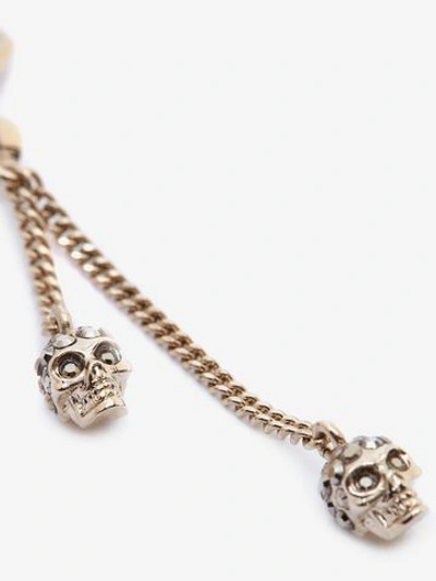 Shop Alexander Mcqueen Chain Skull Earrings In Light Gold