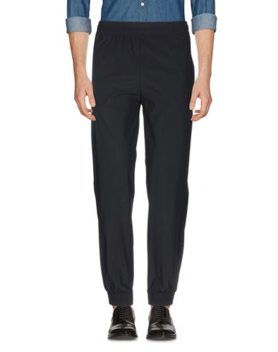 Shop Burberry Casual Pants In Black