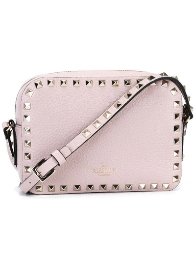 Shop Valentino Rockstud Leather Cross Body Bag In Pink