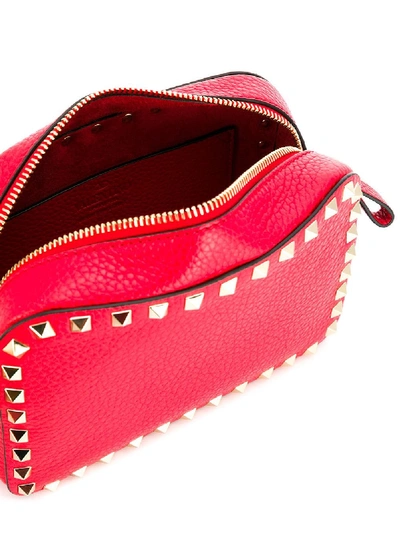 Shop Valentino Rockstud Leather Cross Body Bag In Red