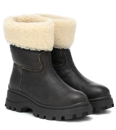 Shop Miu Miu Shearling And Leather Ankle Boots In Black