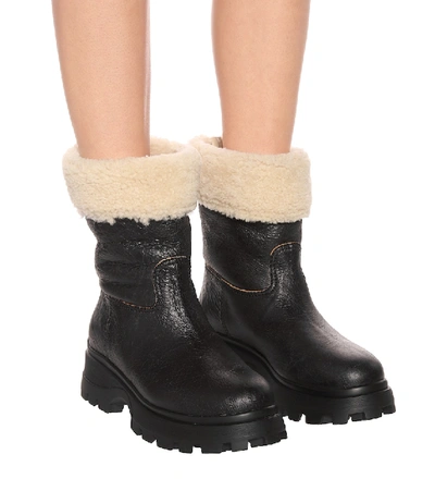 Shop Miu Miu Shearling And Leather Ankle Boots In Black