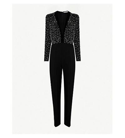 Shop Givenchy Plunge V-neck Relaxed-fit Wool And Silk-blend Jumpsuit In Black