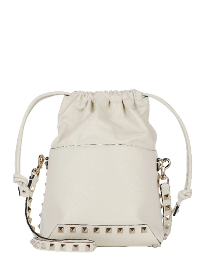 Shop Valentino Rockstud Mini Bucket Bag In Ivory