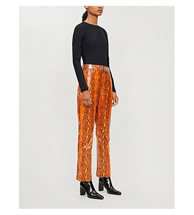 Shop Grlfrnd Snakeskin-print Straight Leather Trousers In Orange Snake