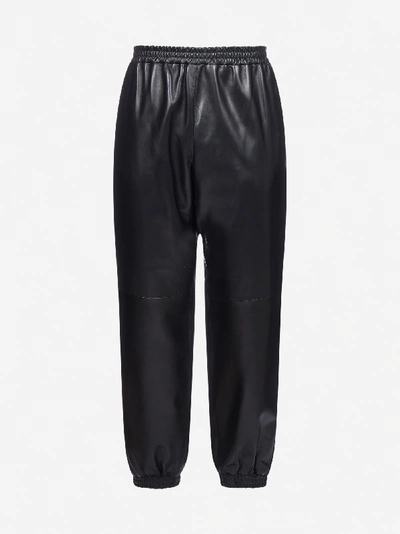 Shop Burberry Pantaloni In Pelle