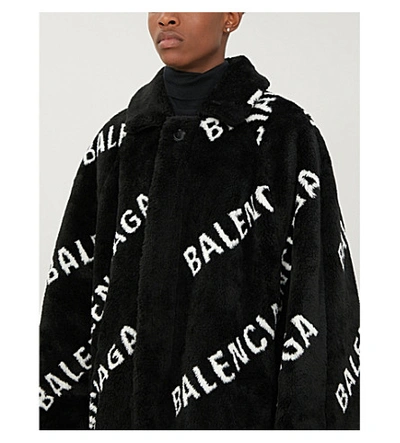 Shop Balenciaga Oversized Logo-print Faux-fur Coat In Black Ivory