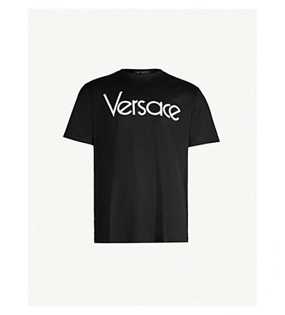 Shop Versace Logo Brand-embroidered Cotton T-shirt In Nero Bianco