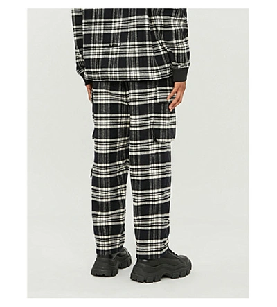 Shop Juun.j Checked Straight Relaxed-fit Cotton-flannel Trousers In Black