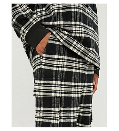 Shop Juun.j Checked Straight Relaxed-fit Cotton-flannel Trousers In Black