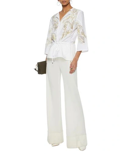 Shop Roberto Cavalli Blouses In White