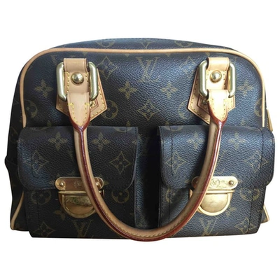 Pre-owned Louis Vuitton Manhattan Leather Handbag In Brown