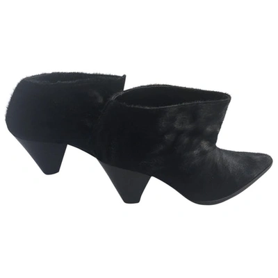 Pre-owned Paola D'arcano Pony-style Calfskin Ankle Boots In Black