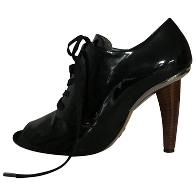 Pre-owned Dolce & Gabbana Patent Leather Lace Up Boots In Black