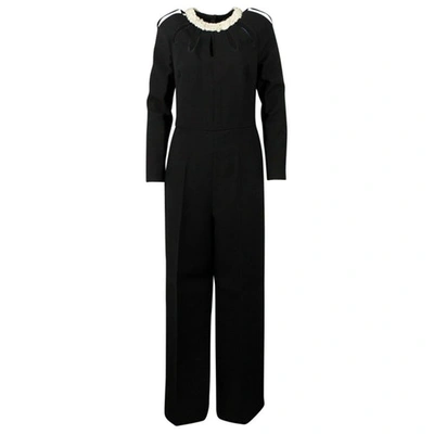 Pre-owned Valentino Wool Jumpsuit In Black