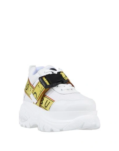 Shop Buffalo Sneakers In White