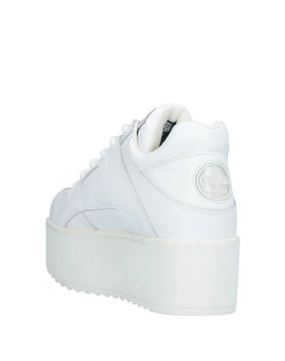 Shop Buffalo Sneakers In White