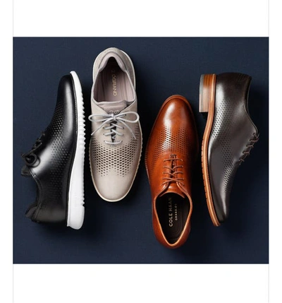 Shop Cole Haan 2.zerogrand Wingtip In British Tan/ Ivory Leather