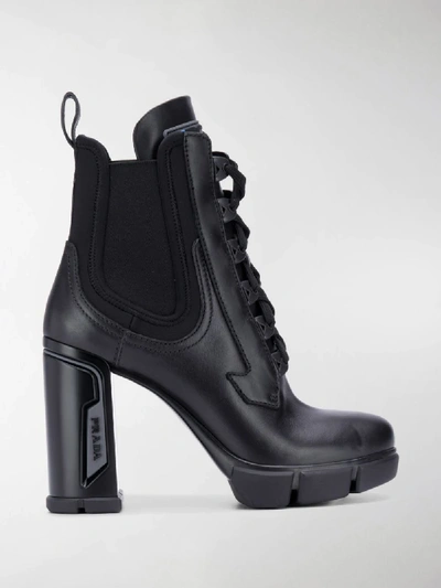 Shop Prada Chunky Heeled Ankle Boots In Black