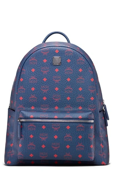 Shop Mcm Stark Coated Canvas Backpack In Deep Blu Sea