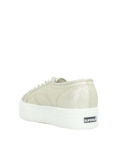 Shop Superga Sneakers In Gold