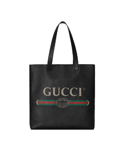 Shop Gucci Gg-print Leather Tote In Black