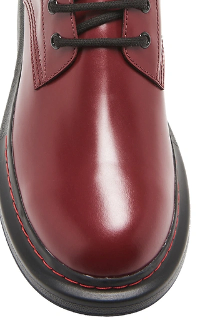 Shop Alexander Mcqueen Leather Ankle Boots In Burgundy