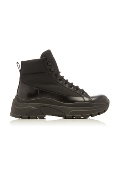 Shop Prada Leather And Shell Ankle Boots In Black