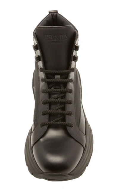 Shop Prada Leather And Shell Ankle Boots In Black