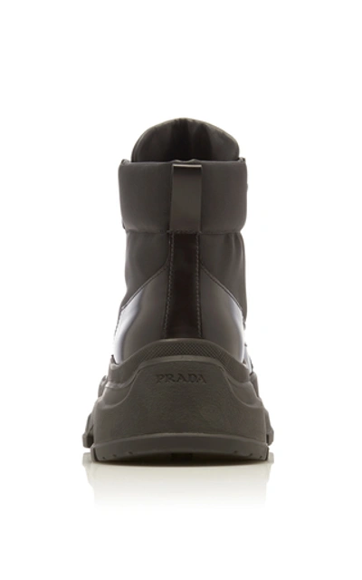 Shop Prada Leather And Shell Ankle Boots In Black