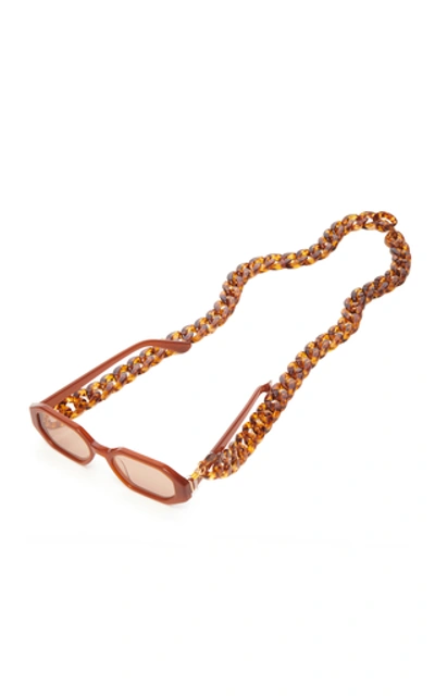 Shop Donni Acrylic Sunglasses Chain In Brown