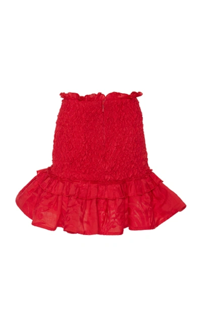 Shop Alexis Nedusa Smocked Ruffled Silk-linen Mini Skirt In Red