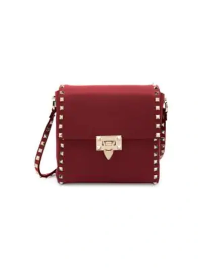 Shop Valentino Garavani Rockstud Leather Shoulder Bag In Raspberry Pink