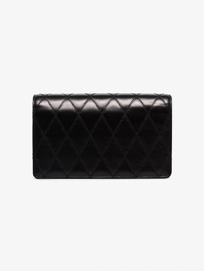 Shop Saint Laurent Black Angie Quilted Leather Shoulder Bag