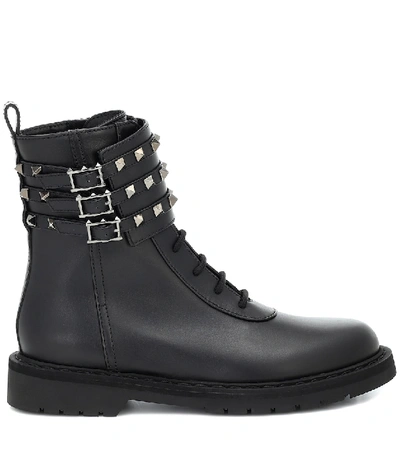 Shop Valentino Rockstud Combat Leather Ankle Boots In Black